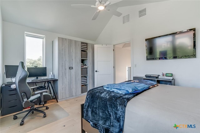 1905 Dutton Dr Unit A, San Marcos, TX 78666 - bedroom with a desk, wood finished floors, high vaulted ceiling, and a ceiling fan