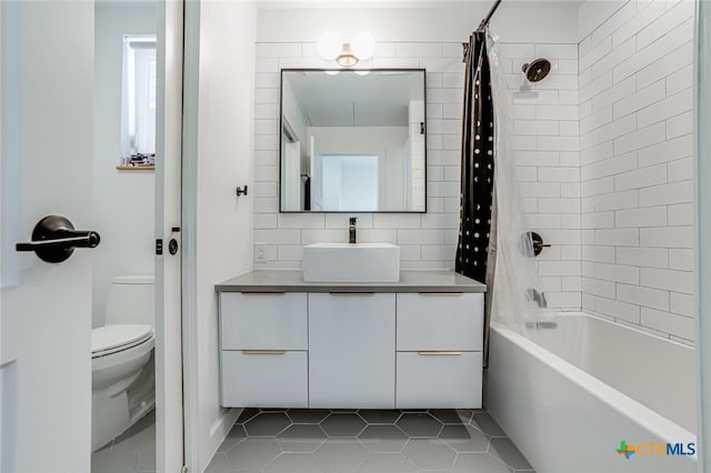 1905 Dutton Dr Unit A, San Marcos, TX 78666 - full bath featuring toilet, shower / bathtub combination with curtain, vanity, and tile patterned flooring