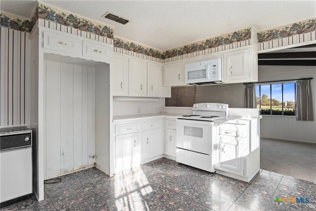 kitchen featuring white cabinetry, white appliances, and a textured ceiling