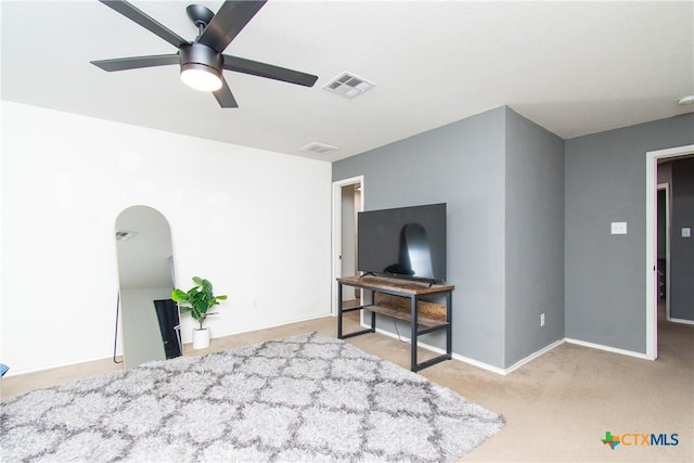 interior space featuring ceiling fan