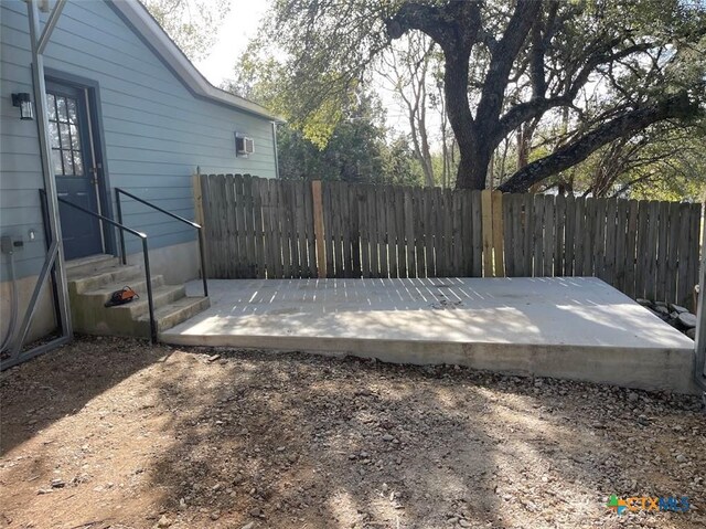 view of yard with a carport and a shed