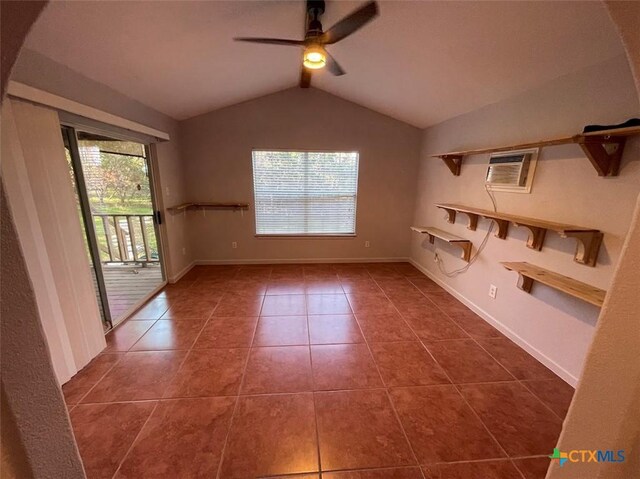 hallway with dark tile patterned floors