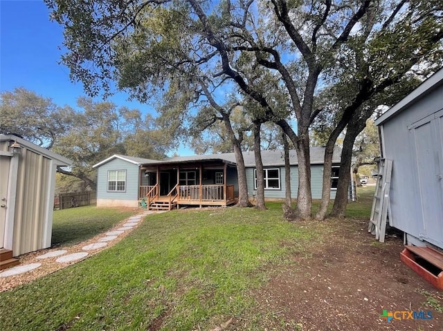 131 Oak Springs Dr, Canyon Lake, TX 78133 - exterior space featuring a deck, a yard, and fence