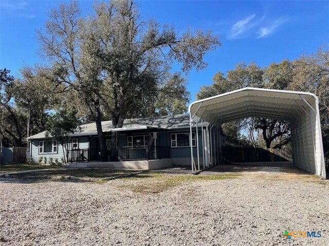 view of yard with a carport