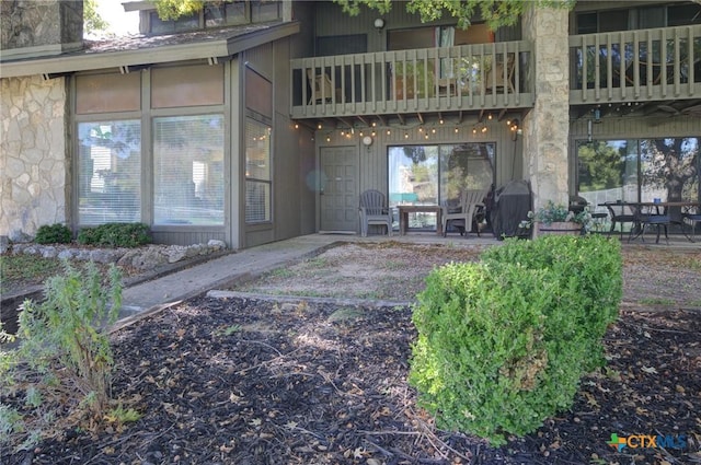 rear view of property with a patio area