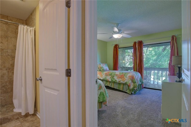 bedroom with ceiling fan, access to exterior, a textured ceiling, and light colored carpet