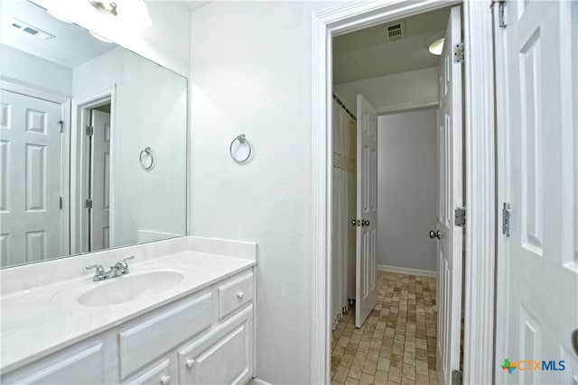 1108 Celtic Cv, Round Rock, TX 78681 - full bath with vanity and brick patterned floors