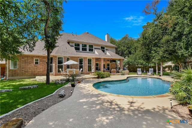1108 Celtic Cv, Round Rock, TX 78681 - swimming pool with a patio and an outdoor living space