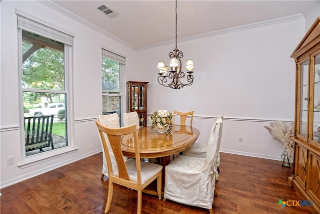 1108 Celtic Cv, Round Rock, TX 78681 - dining area with ornamental molding, a chandelier, and wood finished floors