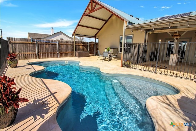 104 Oak Stone Dr, Jarrell, TX 76537 - view of swimming pool with a fenced backyard and a patio area