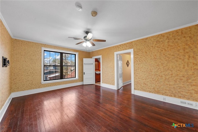 spare room with wallpapered walls, ceiling fan, baseboards, ornamental molding, and wood-type flooring