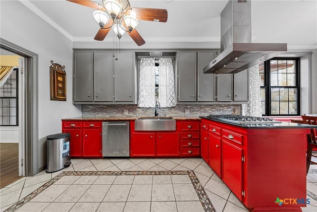 kitchen featuring a sink, stainless steel appliances, red cabinets, and island range hood