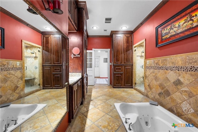 bathroom featuring a whirlpool tub, tile walls, and a shower stall