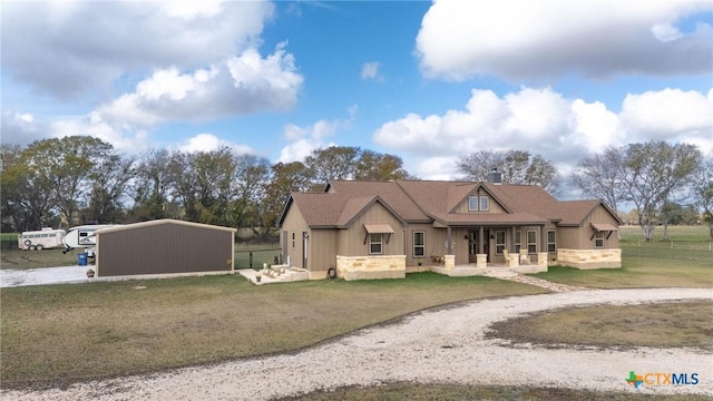 craftsman-style home with a front lawn