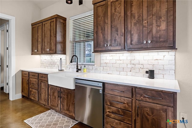 kitchen featuring stainless steel dishwasher, backsplash, dark brown cabinets, and sink