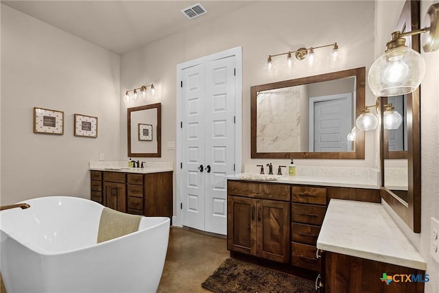 bathroom with a bathing tub and vanity