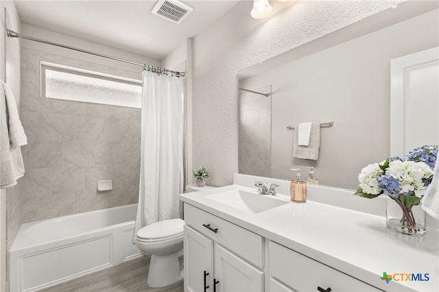 419 Agave Flats Dr, New Braunfels, TX 78130 - full bathroom with vanity, shower / bathtub combination with curtain, and wood finished floors