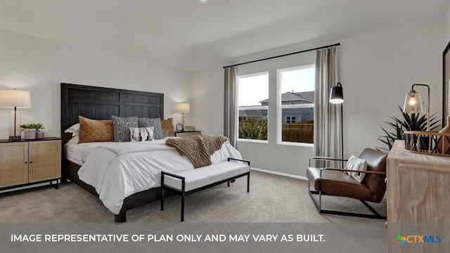 bedroom with carpet flooring and baseboards