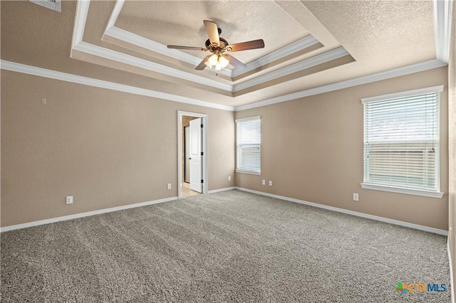 1722 Shadow Canyon Dr, Temple, TX 76502 - unfurnished room with a raised ceiling, crown molding, a textured ceiling, ceiling fan, and carpet