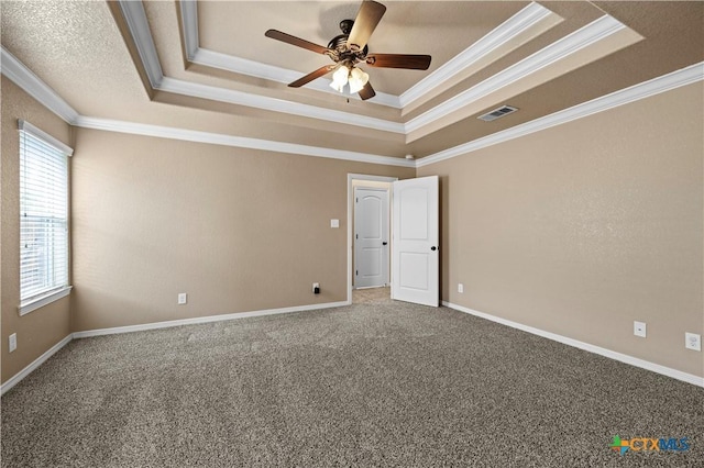 1722 Shadow Canyon Dr, Temple, TX 76502 - carpeted spare room featuring a raised ceiling, crown molding, and ceiling fan