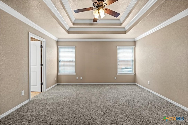 1722 Shadow Canyon Dr, Temple, TX 76502 - carpeted spare room featuring a raised ceiling, crown molding, a textured wall, a textured ceiling, and a ceiling fan