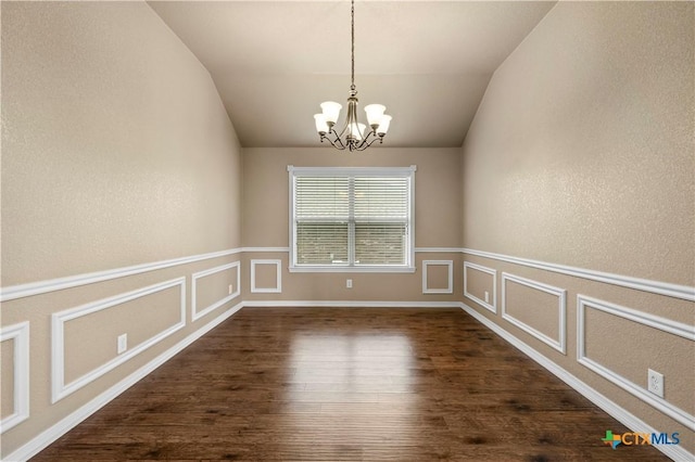1722 Shadow Canyon Dr, Temple, TX 76502 - unfurnished room featuring a chandelier, lofted ceiling, dark wood-style flooring, a decorative wall, and wainscoting