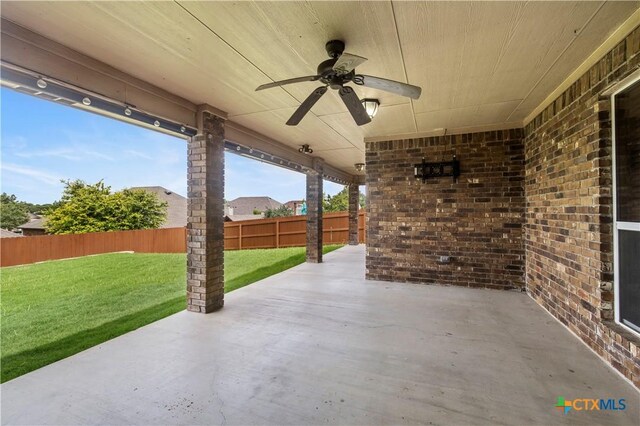 1722 Shadow Canyon Dr, Temple, TX 76502 - fenced backyard with a ceiling fan and a patio