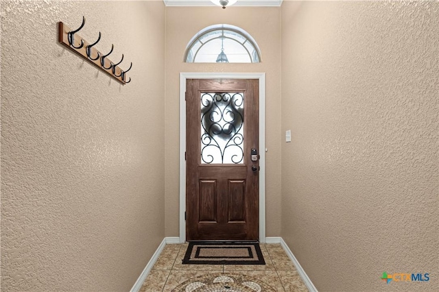 1722 Shadow Canyon Dr, Temple, TX 76502 - entryway featuring a textured wall and baseboards