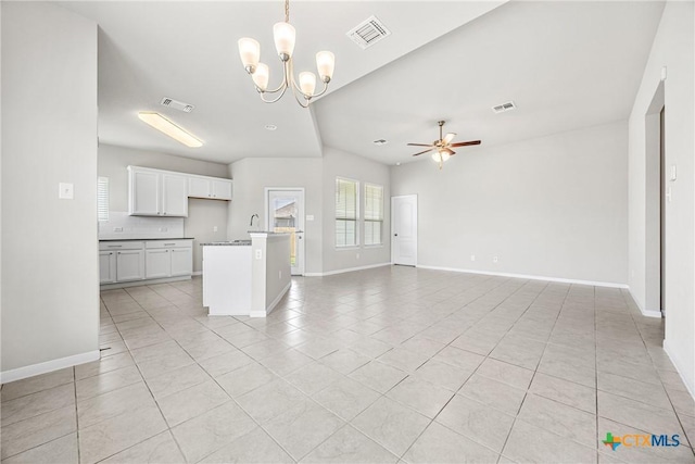 1041 Lakeway Crossing Dr, Temple, TX 76502 - unfurnished living room with light tile patterned flooring, a ceiling fan, a chandelier, and baseboards