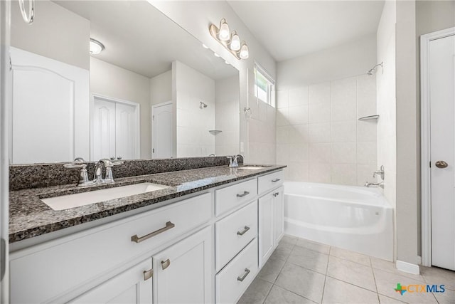 1041 Lakeway Crossing Dr, Temple, TX 76502 - full bath with double vanity, tile patterned floors, shower / washtub combination, and baseboards