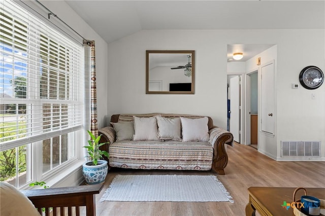 605 Aikman Dr, Troy, TX 76579 - living room featuring plenty of natural light, lofted ceiling, and wood finished floors