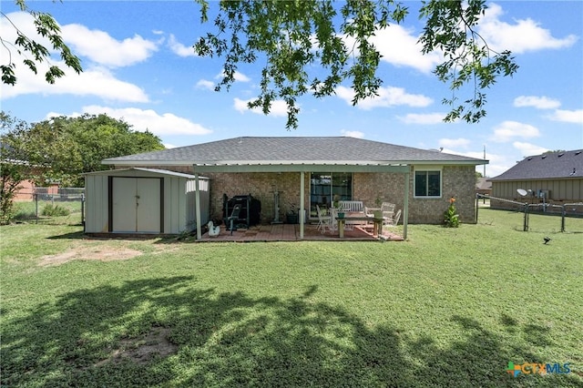 605 Aikman Dr, Troy, TX 76579 - rear view of property featuring a fenced backyard, a storage shed, brick siding, and a deck