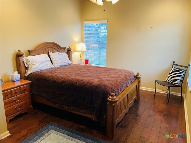 bedroom featuring dark hardwood / wood-style flooring