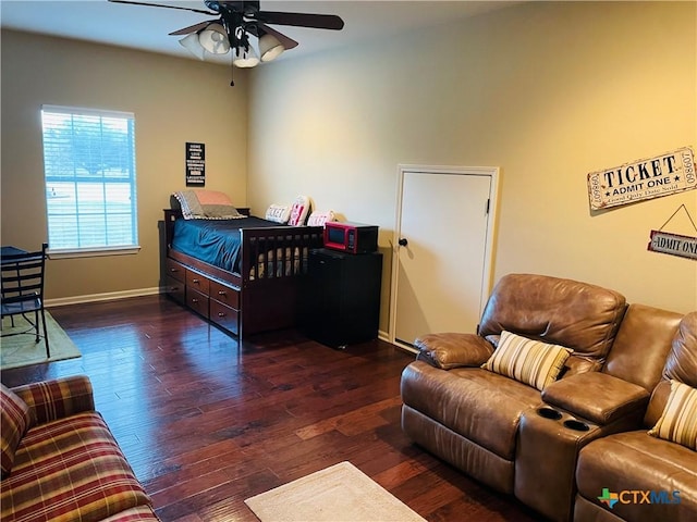 bedroom featuring dark hardwood / wood-style flooring