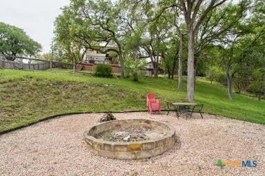 25420 Cove Dr, Spicewood, TX 78669 - view of yard with a fire pit and fence