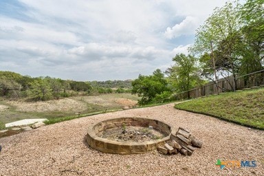 25420 Cove Dr, Spicewood, TX 78669 - view of home's community featuring an outdoor fire pit