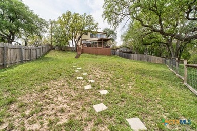 25420 Cove Dr, Spicewood, TX 78669 - view of yard with a fenced backyard