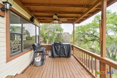 25420 Cove Dr, Spicewood, TX 78669 - wooden terrace with ceiling fan