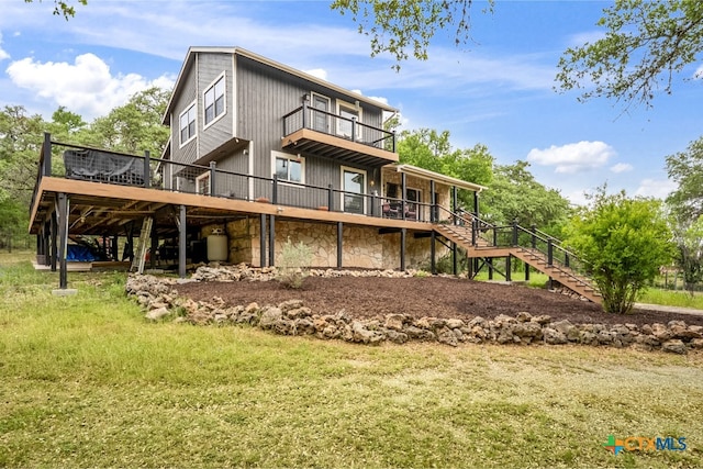 805 Sunrise Trl, Spring Branch, TX 78070 - back of property featuring stairway, a wooden deck, and stone siding