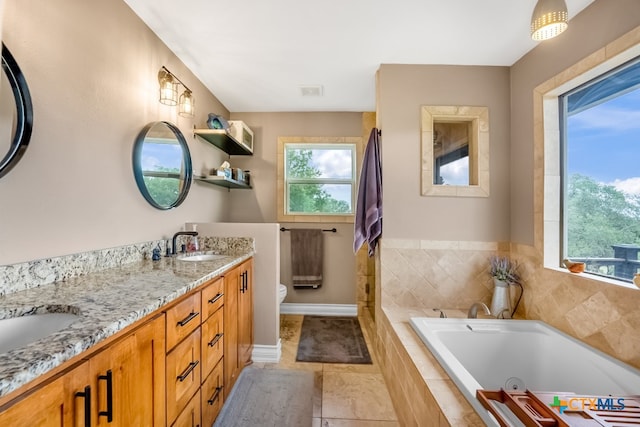 805 Sunrise Trl, Spring Branch, TX 78070 - full bath featuring double vanity, a tub with jets, and tile patterned floors