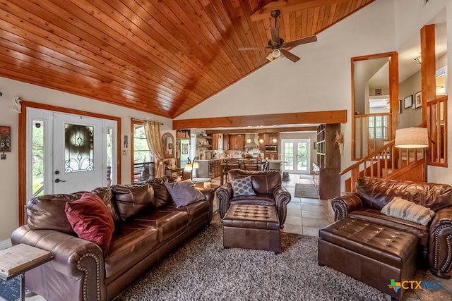 805 Sunrise Trl, Spring Branch, TX 78070 - carpeted living area with wooden ceiling, a ceiling fan, tile patterned floors, and high vaulted ceiling