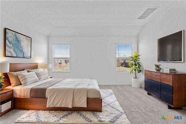 130 Carmello, Kyle, TX 78640 - bedroom featuring lofted ceiling, light colored carpet, and visible vents