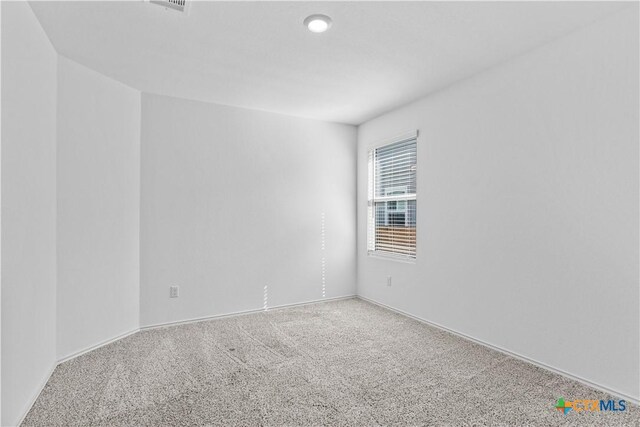 130 Carmello, Kyle, TX 78640 - empty room with baseboards and carpet flooring