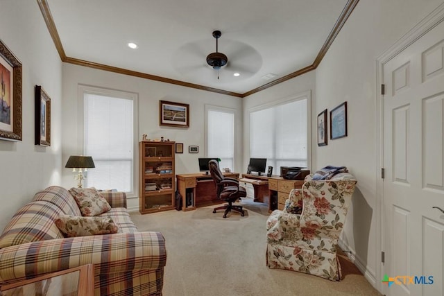 carpeted home office featuring ceiling fan and ornamental molding