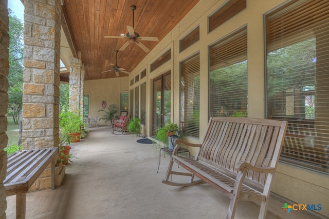 view of patio featuring ceiling fan