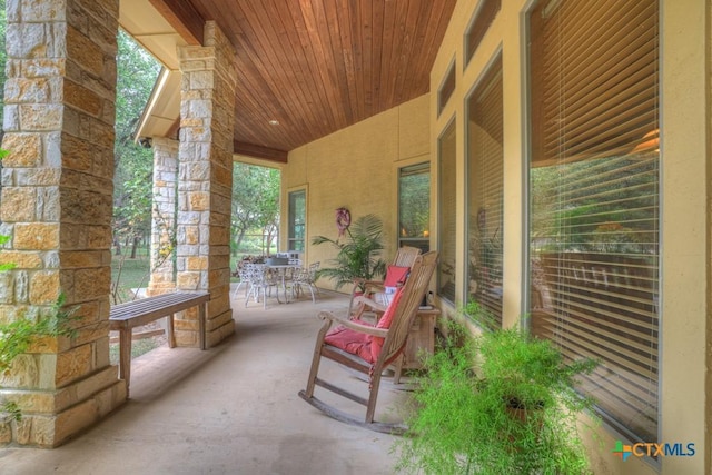 197 Falling Hls, New Braunfels, TX 78132 - covered porch featuring outdoor dining space