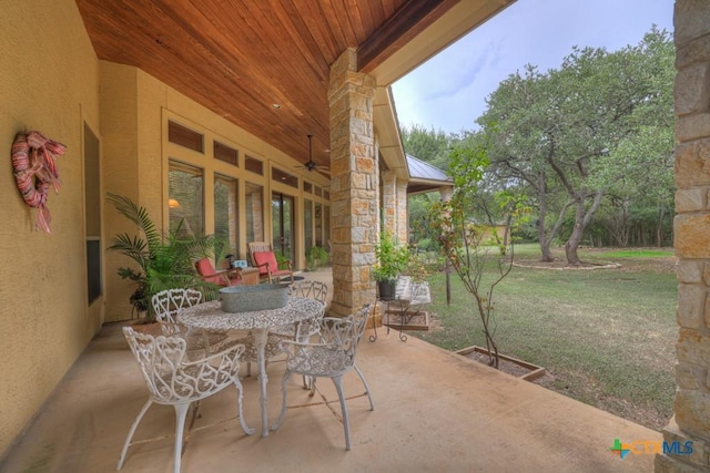 197 Falling Hls, New Braunfels, TX 78132 - view of patio / terrace featuring outdoor dining area and a ceiling fan