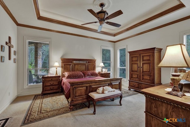 197 Falling Hls, New Braunfels, TX 78132 - bedroom with a tray ceiling, light colored carpet, baseboards, ornamental molding, and a ceiling fan
