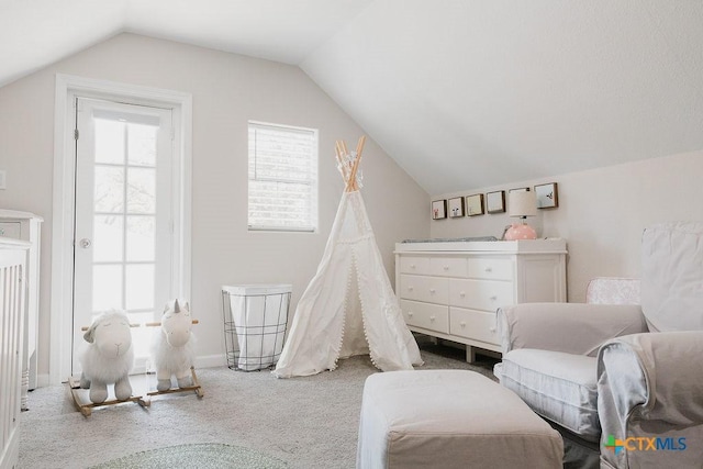 recreation room featuring carpet floors, lofted ceiling, and baseboards