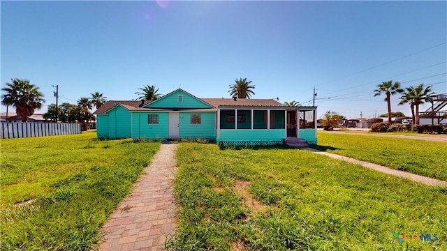 view of front of home with a front lawn